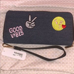 Hand wallet.Change pocket.Card slots.Phone holder